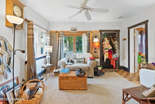 living room featuring ceiling fan