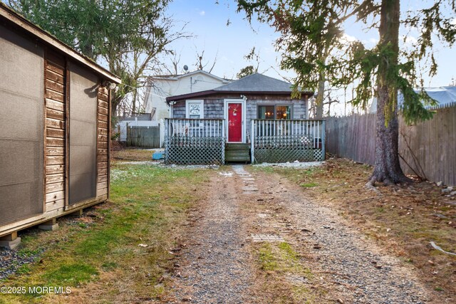 view of front of house with a wooden deck