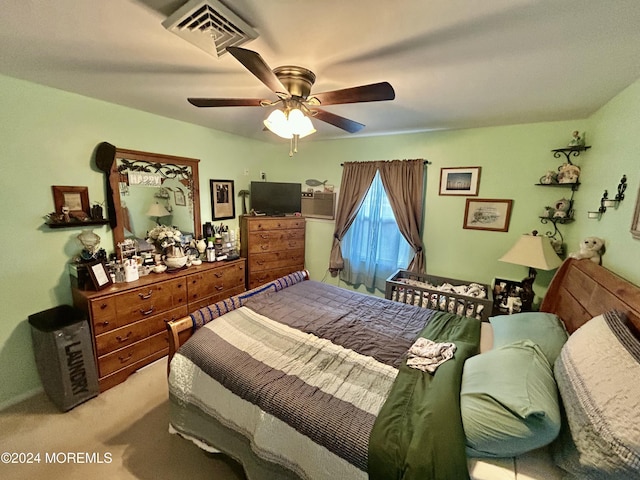 bedroom with ceiling fan and carpet