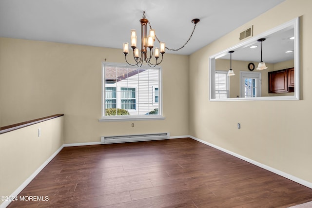 unfurnished dining area featuring a wealth of natural light, dark wood-type flooring, a baseboard radiator, and a notable chandelier