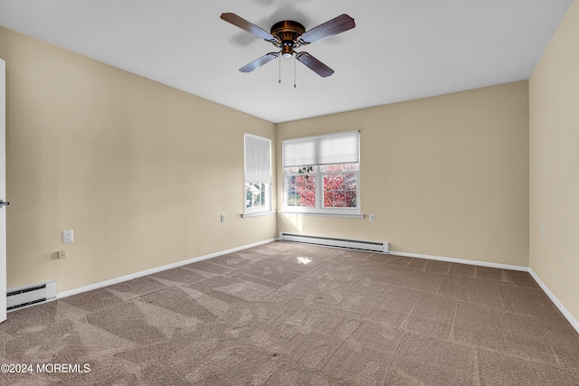 empty room featuring ceiling fan, carpet floors, and baseboard heating