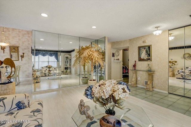 interior space with a textured ceiling