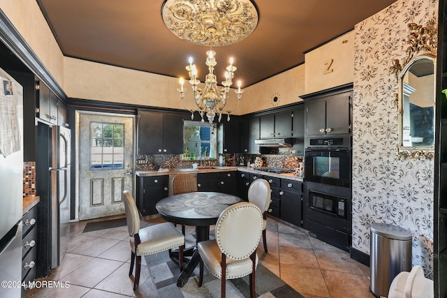 448 Monmouth Pl, Long Branch, NJ 07740 - dining area with a chandelier and light tile patterned floors
