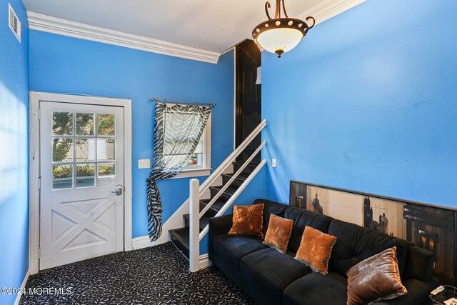 interior space with crown molding