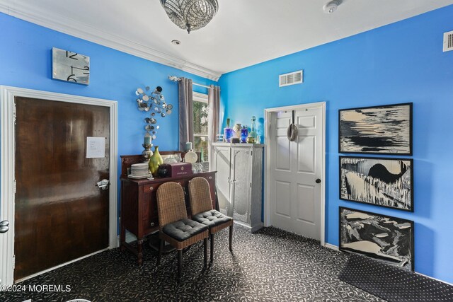 interior space featuring crown molding