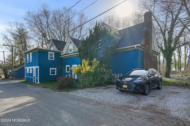 448 Monmouth Pl, Long Branch, NJ 07740 - view of side of home with a chimney