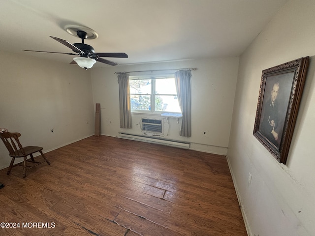 spare room with dark hardwood / wood-style floors, ceiling fan, an AC wall unit, and a baseboard heating unit