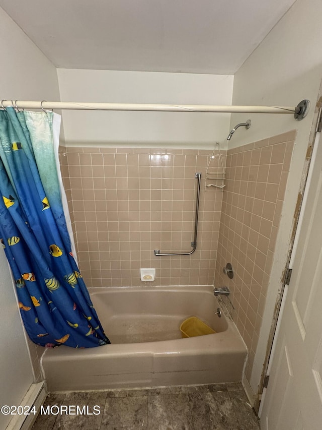 bathroom with shower / tub combo