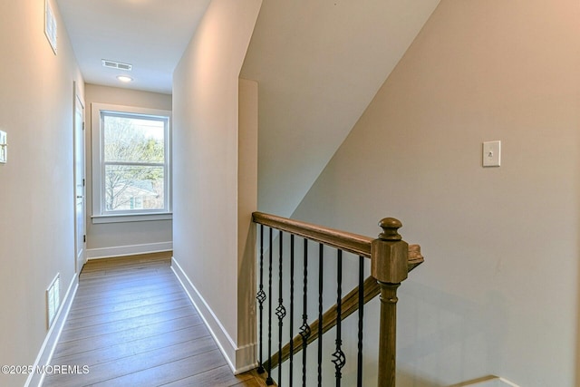 hallway featuring hardwood / wood-style flooring