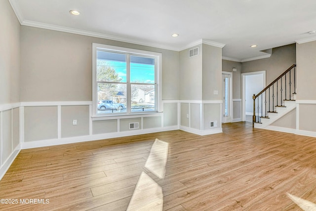 1032 3rd Ave, Toms River, NJ 08757 - empty room featuring light wood-style floors, ornamental molding, stairs, and recessed lighting