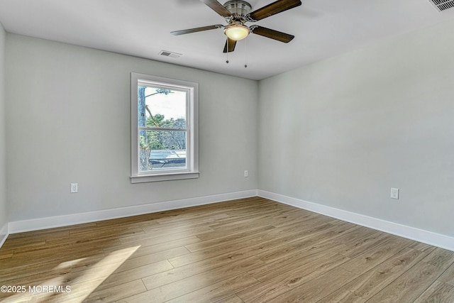 1032 3rd Ave, Toms River, NJ 08757 - spare room with light wood finished floors and a ceiling fan
