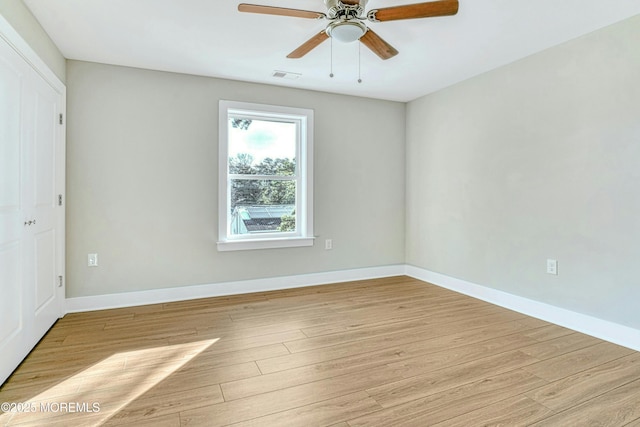 1032 3rd Ave, Toms River, NJ 08757 - empty room featuring wood finished floors and a ceiling fan