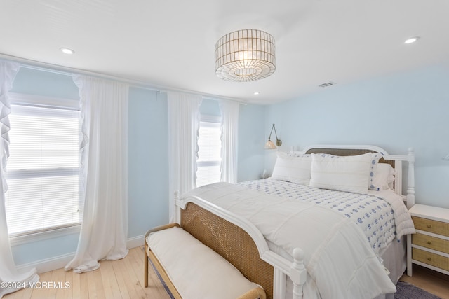 bedroom featuring hardwood / wood-style floors