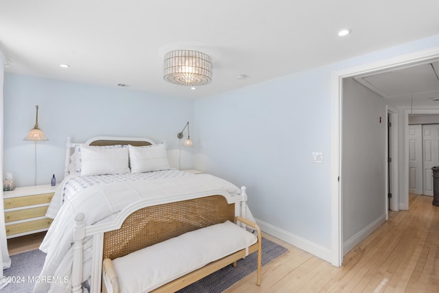 bedroom featuring hardwood / wood-style floors