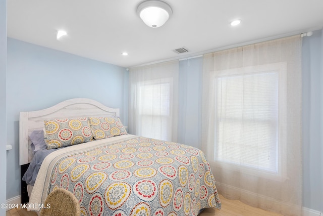 bedroom featuring light hardwood / wood-style floors