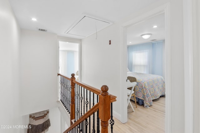 hallway featuring light hardwood / wood-style flooring