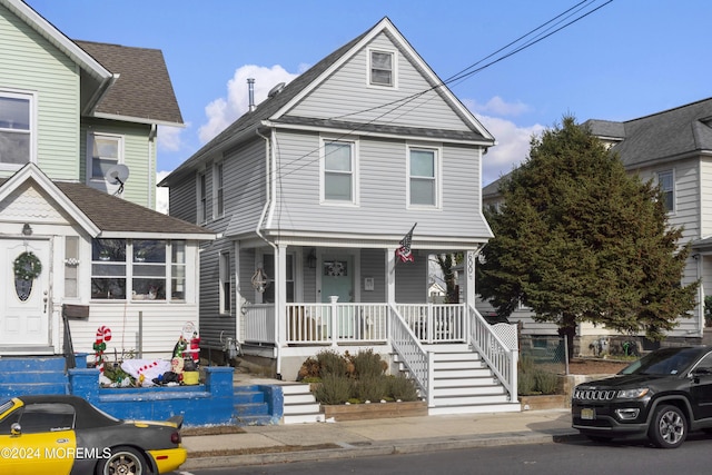 view of property with a porch