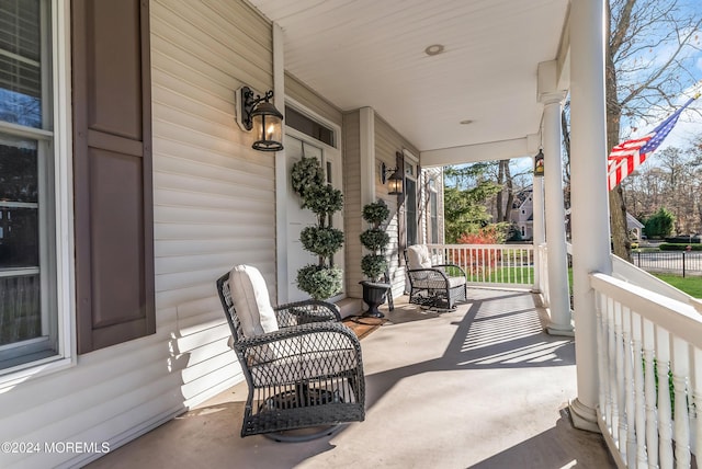 view of patio featuring a porch