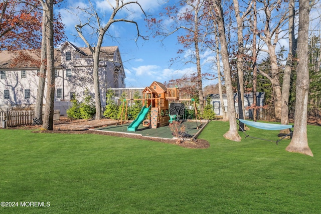 view of jungle gym with a lawn