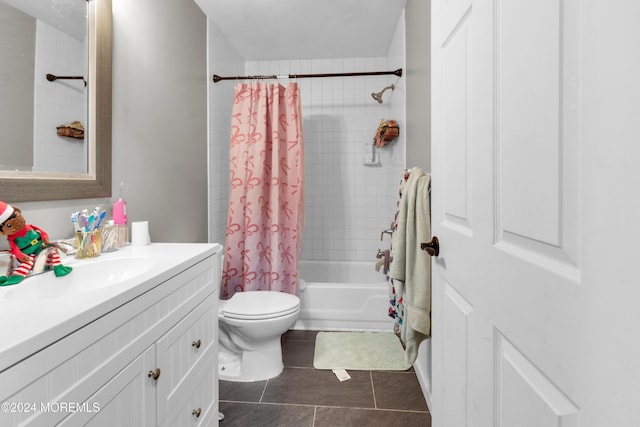 full bathroom with tile patterned flooring, vanity, shower / tub combo with curtain, and toilet