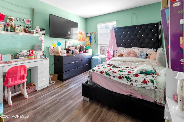 bedroom featuring dark wood-type flooring