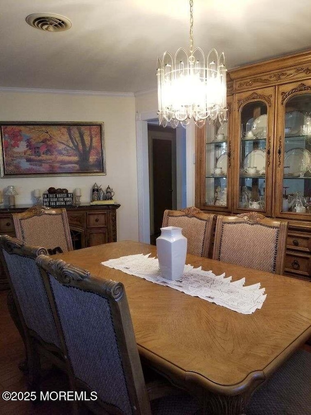 33 Penwood Dr Unit 55, Whiting, NJ 08759 - dining area with a chandelier and ornamental molding