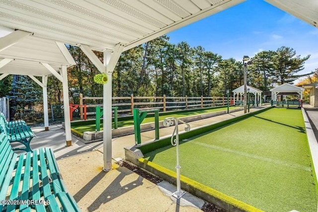 33 Penwood Dr Unit 55, Whiting, NJ 08759 - view of community with a game area and fence