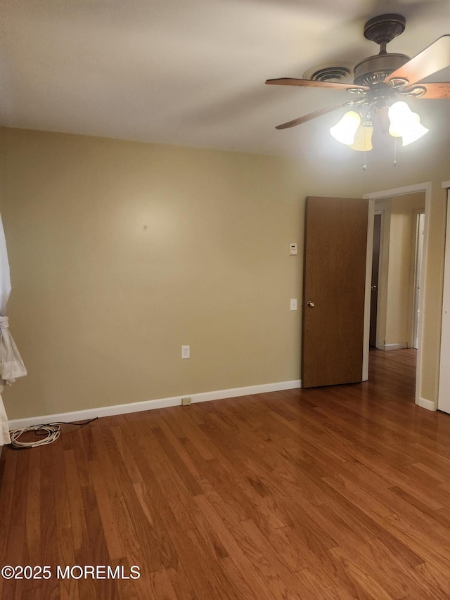 33 Penwood Dr Unit 55, Whiting, NJ 08759 - spare room featuring ceiling fan, wood finished floors, and baseboards
