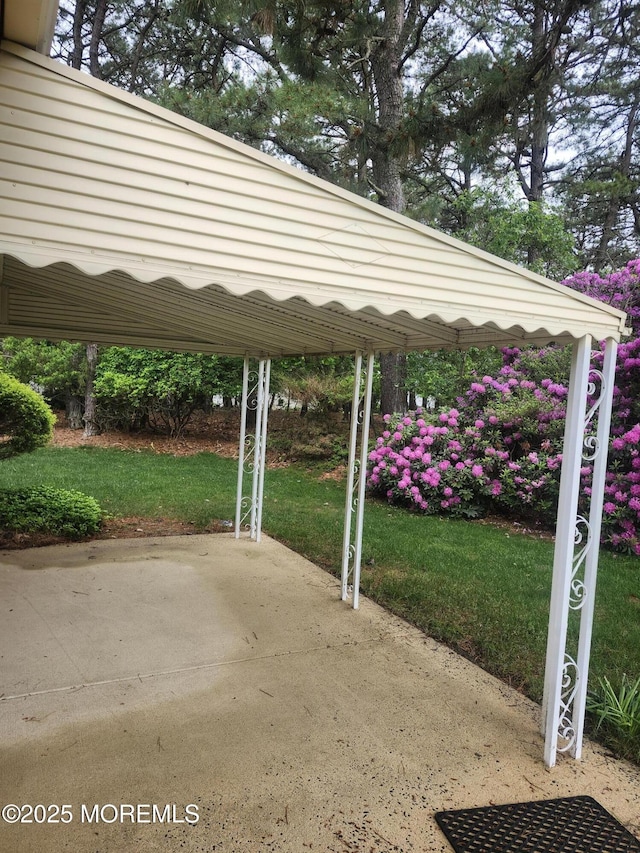 33 Penwood Dr Unit 55, Whiting, NJ 08759 - view of parking / parking lot featuring a carport