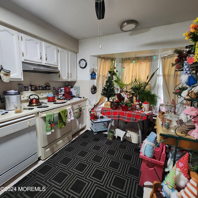 kitchen featuring white cabinetry, white electric range oven, tasteful backsplash, and dishwashing machine