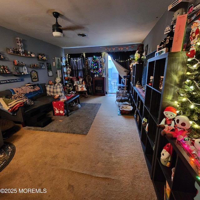 interior space featuring ceiling fan