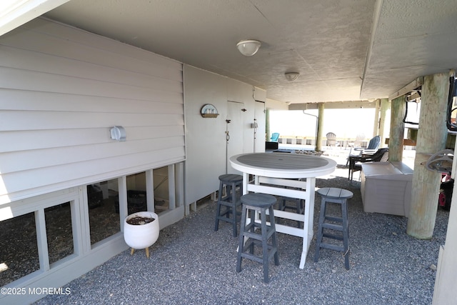 view of patio featuring outdoor dining space