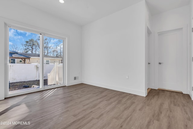 empty room featuring light hardwood / wood-style floors