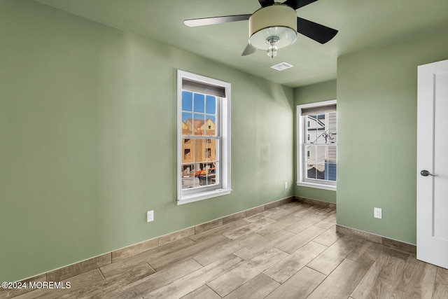 empty room with ceiling fan