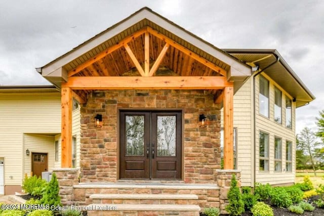 doorway to property with french doors