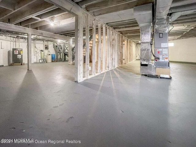 basement featuring electric water heater