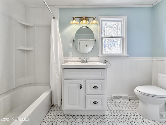 full bathroom with tile patterned flooring, vanity, shower / tub combo, and toilet