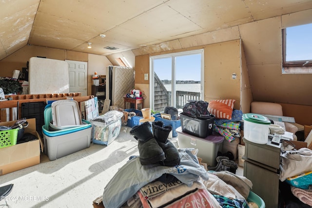 additional living space with a water view and vaulted ceiling