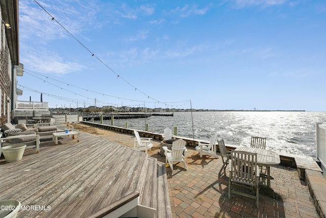 view of patio with a water view