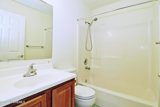 full bathroom with vanity, bathing tub / shower combination, and toilet