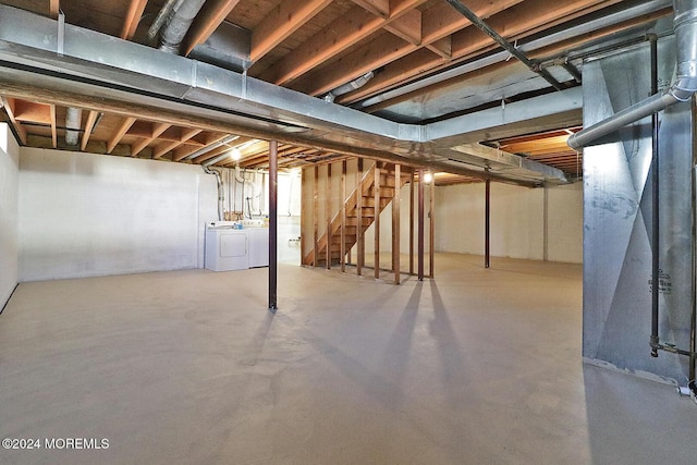 basement with washing machine and dryer