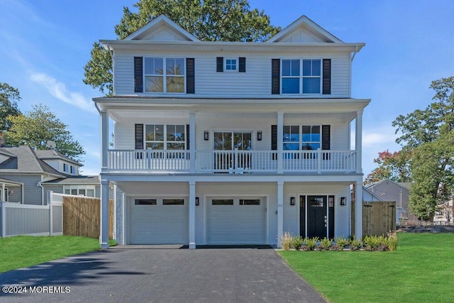 front facade with a front lawn and a garage