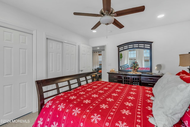 carpeted bedroom featuring ceiling fan