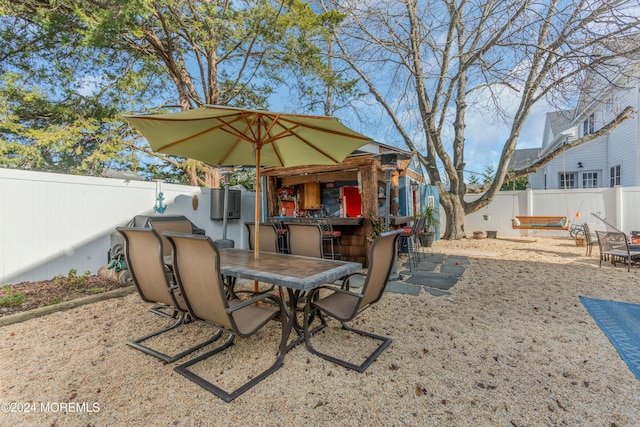 view of patio / terrace featuring a bar