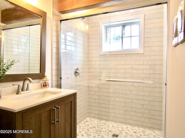 bathroom featuring vanity and walk in shower