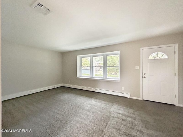 carpeted foyer entrance featuring a baseboard radiator