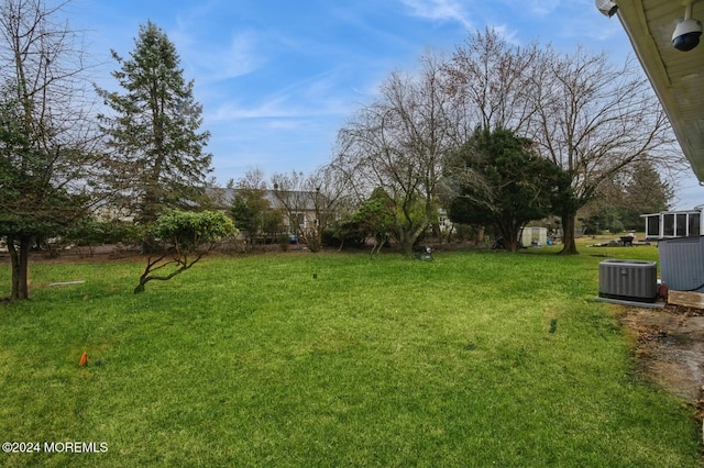 view of yard featuring central AC