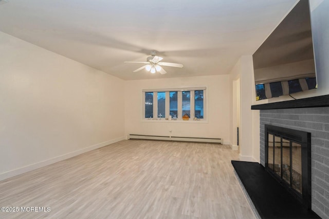 unfurnished living room with ceiling fan, a baseboard radiator, a brick fireplace, and light hardwood / wood-style flooring