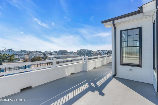 view of patio with a balcony