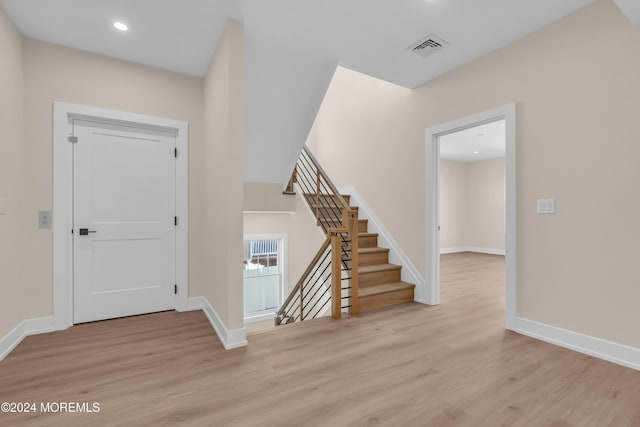 foyer entrance featuring light wood-type flooring